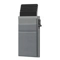Close-up of gray RFID aluminum card holder with automatic pop-up mechanism and 5 cards - Side-push Grey + Grey Flat Sticker