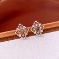 Detail of hollow diamond-shaped earrings with tiger eye stone in retro silver finish - Vintage Hollow Rhombus Stud Earrings / Silver Pin-Light Coffee Gold(Earrings)