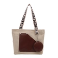 Beige canvas tote backpack with brown leather pocket and patterned strap - Off White