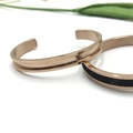 Minimalist C-shaped open bangles in rose gold finish with black leather inlay accents - Square Rose Gold