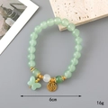 Elegant green crystal beaded bracelet with butterfly and gold lucky charm pendant - Green Glaze Bead + Fu Character (K3331)