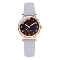Women's rose gold quartz watch with starry blue dial and grey leather strap - Gray