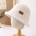 Chic beige faux shearling bucket hat with premium leather tag for winter warmth - Beige