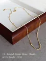Detail of 18k gold plated round snake chain with beads featuring a lobster clasp closure - Style 19: Gold Round Snake Bead Chain 41+6cm