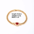 Gold Cuban chain bracelet featuring an oval red gemstone and clear zircon accents - Gold + Large Oval Red Zircon