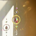 Rainbow crystal suncatcher with gold heart frame and colorful natural stones - Citrine