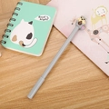 Creative gray gel pen with a 3D cartoon hamster design on a desk with notebooks - Grey Squirrel