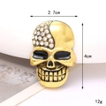 Bijou de chaussure crâne doré avec strass, dimensions de 2,7 cm par 4 cm - Crâne Souriant Doré (D2915)