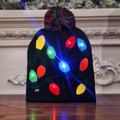 LED dinosaur Christmas knitted hat with colorful glowing bulbs and top pom-pom - Black String Lights