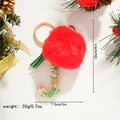 Detailed view of Christmas initial J keychain with red pompom and festive sequins - Letter J