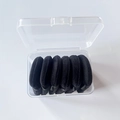Set of 6 black heart-shaped velvet makeup puffs stored in a clear plastic container - 6pcs in Box / Black