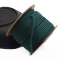 Detail of 1.5mm dark green cotton cord showing braided texture on a spool for DIY jewelry - Approx. 1.5MM / Dark Green