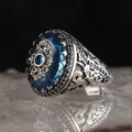 Detail of vintage men's ring featuring blue gemstone and intricate engraved silver band - Antique Silver Carved Blue Gem(KJZ030XS)