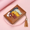 Brown faux leather coin purse featuring colorful cat patches and a stylish tassel - Brown