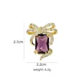 Detail view of purple crystal brooch with gold bow and dimensions 2.7cm by 2.2cm - B794 Purple/Elegant Bow