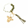 Western beaded wristlet keychain featuring cactus beads, green tassel, and cow head charm - Cactus Green White