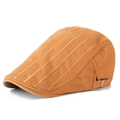 Close-up of orange cotton beret featuring decorative stitching and silver metal buckle - Adjustable / Yellow