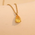 Birthstone necklace featuring a gold chain and pear-shaped yellow crystal pendant - May (Yellow)