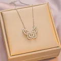 Exquisite gold butterfly necklace with hollowed-out zircon inlay on elegant jewelry box - 6036 Butterfly Zircon / Silver