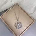 Double-layer flower necklace with zircon pendants on silk fabric in jewelry box - White