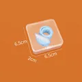 Blue plush accessory with wings in 6.5x6.5x2cm transparent square plastic storage box - 6.5*6.5*2cm