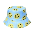 Detailed close-up of light blue canvas bucket hat with all-over yellow smiley face patterns - Smiley Face Sky Blue