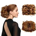 Detail of synthetic hair bun with internal combs and honey brown wavy texture - 30# (Light Auburn)