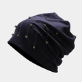 Detailed view of navy velvet beanie with sparkling rhinestones and pearl embellishments - M (56-58cm) / Navy Blue