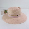 Detail of pink straw sun hat with sequin accents and elegant ribbon with a metal badge - M (56-58cm) Adjustable / Pink