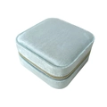 Portable light blue velvet jewelry box with square design and golden zipper closure - Light Blue