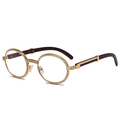 Retro round sunglasses with colorful rhinestones and gold metal frame shown at 45-degree angle - Clear