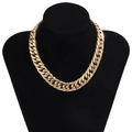 Exaggerated golden aluminum layered Cuban link chain necklace on a black mannequin bust - Polished Gold Cuban Chain
