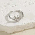 Adjustable silver ring with sparkling starburst zircon crystals on textured stone - Eye Sunburst Style / Platinum Color