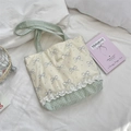 Close-up of lace splicing and blue bow patterns on the canvas tote bag detail - Cream Base Shoulder Style (Bowknot Checkered)