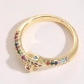 Detail view of gold snake ring featuring vibrant colorful zircon stones and crystals - Snake Ring / Gold/Multicolor