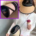 Foldable khaki woven sun visor hat with wide brim and black trim detail for women - Crossbody & Rollable / Beige
