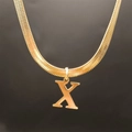 Flat gold snake chain necklace featuring a minimalist letter X pendant in stainless steel - Letter X (5592272000744)