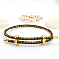 Close-up of black and gold woven rope bracelet with adjustable metal infinity clasp - 3mm Semi-finished (Single End Fixed) / Black-Gold