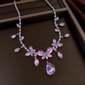 Macro view of pink marquise zircon butterfly necklace and water drop earrings in a box - Necklace-Purple-Butterfly Water Drop