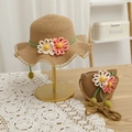 Detail of children's straw hat and matching bag set with large daisy flower accents - S (Kids 52cm) / Hat + Bag Set / Khaki