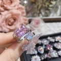 Detailed close-up of pink and white rectangular zircon double stone ring on silver band - Style 0156-Pink Rectangular Gemstone