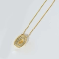 Puffy oval alphabet pendant necklace in gold finish with micro-pave crystal stones - Letter D