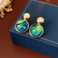 Detailed view of vintage gold stud earrings with blue and yellow resin inlay in a jewelry box - 1# Steel Pin-Gold Blue