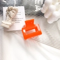 Minimalist bright orange acetate hair claw clip with a rectangular hollow design - Vitality Orange