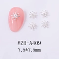 Close-up of silver starburst nail charm with center pearl on pink fingernail - Silver Starburst Pearl (A409)