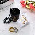 Black Groom's Team and white Groom to Be plastic shot glasses with gold beads - White Groom to Be