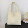 Minimalist beige canvas tote bag with shoulder straps and Fashion Instify label - Off White
