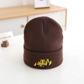 Close-up of yellow excavator embroidery on dark brown knitted beanie for boys - 52-54cm / Coffee