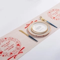 Christmas table runner with red Merry Christmas print on beige linen fabric - Bronzing Red Wreath