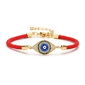 Adjustable red braided rope bracelet with gold evil eye charm and lobster clasp - Red Round Style (CB0222CX)